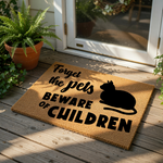 Forget the pets beware of children coir doormat featuring a black cat silhouette, this funny front porch welcome mat is a durable natural fiber rug for parents who want a humorous home entrance decor piece for their house or