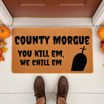 Funny Halloween doormat featuring County Morgue text and a tombstone graphic, this natural coir welcome mat is a spooky front porch decor piece for fall, perfect for a horror themed entryway or a dark humor home entrance