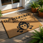 Personalized monkey doormat featuring a cute primate illustration and custom family name text, this durable coir welcome mat is a fun housewarming decor piece for your front porch or entryway floor, perfect for animal lovers.
