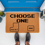 Gaming doormat with Choose One text and keyboard key graphics for Enter and Esc, featuring a natural coir fiber welcome mat design that makes a fun housewarming gift for gamers and computer enthusiasts at their front door