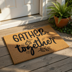 Gather Together fall doormat featuring a natural coir fiber texture with black printed text, pumpkin, and leaf designs, making this autumn welcome mat a festive front porch decor piece for your home entrance during the harvest