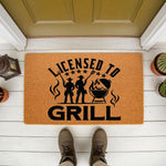 Licensed to Grill doormat featuring a cowboy barbecue design on a natural coir welcome mat, perfect for a porch or patio entrance, this funny outdoor floor rug makes a great housewarming decor piece for any backyard cooking