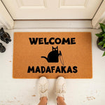 Funny cat welcome doormat featuring a black cat holding a knife, this rude outdoor entry rug is a humorous front porch mat for cat lovers who enjoy dark humor and sarcastic home decor for their entryway or apartment door entrance.
