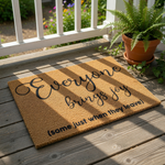 Funny welcome doormat with the text Everyone brings joy some just when they leave, a natural coir fiber outdoor rug for your front porch decor that makes a humorous housewarming gift for friends or family with a sarcastic sense