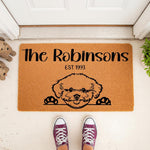 Personalized Bichon Frise doormat for dog lovers, featuring a cute curly-haired dog illustration on a durable coir welcome mat, perfect for a custom family name entrance rug or a unique housewarming gift for pet owners.