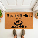 Personalized dog breed doormat featuring a custom family name and established year, this natural coir welcome mat displays a cute spaniel illustration with paws, perfect for a front porch entry or housewarming gift for pet lovers.