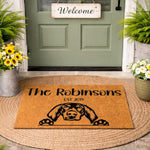 Personalized dog breed doormat featuring a custom family name and year on a natural coir welcome mat, displayed on a porch with a hound dog illustration, perfect for a front door entrance or housewarming decor for pet lovers.