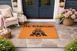 Personalized dog welcome doormat featuring a cute doodle dog illustration on a natural coir fiber mat, perfect for a front porch entryway, custom family name floor rug, and durable outdoor home decor for pet lovers and dog owners.