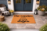 Personalized dog breed doormat featuring a cute doodle illustration on a natural coir welcome mat, perfect for a front porch entry.