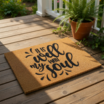 It Is Well With My Soul coir doormat featuring black script lettering on a natural fiber welcome mat, perfect for a farmhouse porch decor entry way or as a religious housewarming floor rug for your front door entrance.