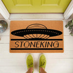 Personalized UFO doormat with a space alien theme, featuring a black flying saucer graphic on a natural coir welcome mat, perfect for sci-fi fans looking for a unique front porch rug or custom outdoor floor mat for their home