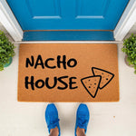 Nacho House doormat featuring a funny food pun design on natural coir fiber, perfect for a front porch entry.