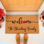 Personalized fall welcome doormat with a red maple leaf design, featuring custom family name text on a natural coir fiber mat, perfect for autumn porch decor, front door entryways, and seasonal housewarming home entrance styling.