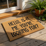 Funny welcome doormat with black text on natural coir fiber, featuring a humorous song lyric quote for a front porch entry.