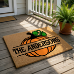 Personalized pumpkin doormat featuring a large orange gourd design with a custom family name, this natural coir welcome mat is a festive fall porch decor piece for autumn home entryways and seasonal housewarming celebrations.