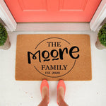 Personalized family name doormat featuring a custom last name and established year on a natural coir welcome mat, perfect for a front porch entryway decor update that adds a stylish touch to your home entrance and housewarming