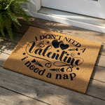 Funny Valentine doormat with I don't need a Valentine I need a nap text, featuring black typography and heart icons on a natural coir fiber welcome mat, perfect for a humorous front porch decor or a sarcastic holiday home