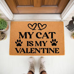Cat Valentine doormat featuring a natural fiber coir welcome mat with black text and paw prints, perfect for a front porch entry.