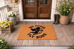 No Cupid Fly Zone doormat featuring a black silhouette of a winged archer on a natural fiber welcome mat, perfect for a funny Valentine's Day porch decor entrance rug that keeps the holiday spirit lighthearted and humorous for