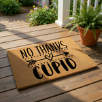 No Thanks Cupid doormat, a funny Valentine's Day welcome mat made of natural coir fiber with black text and an arrow heart design, perfect for a humorous front porch entry rug or a sarcastic holiday home decor floor mat for your