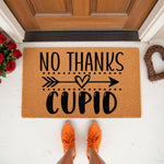 No Thanks Cupid doormat featuring a funny Valentine's Day quote on natural coir fiber, perfect for a front porch entry.