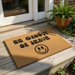 Be Groovy Or Leave coir doormat featuring a retro smiley face design, this natural fiber welcome mat is a fun front porch rug for your home entrance, adding a stylish and cheerful vibe to your outdoor decor with its bold