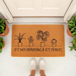 Funny plant lover doormat with line art potted plants and the text It's Not Hoarding If It's Plants, this natural coir welcome mat is a perfect housewarming gift for gardeners and indoor plant enthusiasts for their front porch