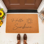 Hello Sunshine doormat featuring a cheerful sun design on a natural coir fiber welcome mat, perfect for a front porch entryway decor update that adds a warm and inviting touch to your home entrance for guests and family members.