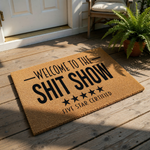 Funny welcome to the shit show doormat made of natural coir fiber, featuring five star certified text and black stars on a durable outdoor entrance mat for a humorous home decor look that greets guests with a blunt and funny