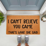 Funny doormat with the text I Can't Believe You Came That's What She Said, a natural coir fiber welcome mat for front porch decor that makes a humorous housewarming gift for friends who love sarcastic and witty home entrance mats.