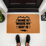Funny Home Is Where My Mat Is doormat featuring a comic book style graphic on natural coir fiber, perfect for a front porch entryway.