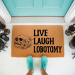 Funny skull floral doormat with dark humor text on a natural coir welcome mat, perfect for gothic home decor or a spooky front porch entrance, featuring a bold black design on a durable fiber rug for a unique and edgy entryway