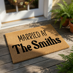 Personalized Married AF doormat for couples, a funny custom coir welcome mat with bold black text on a natural fiber rug, perfect for a wedding or housewarming entry decor that adds humor to your front porch or home entryway.