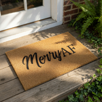 Merry AF funny Christmas doormat made of natural coir fiber with a bold black script design, perfect for a humorous holiday front porch welcome mat or a cheeky seasonal entryway rug for your home decor during the winter festive
