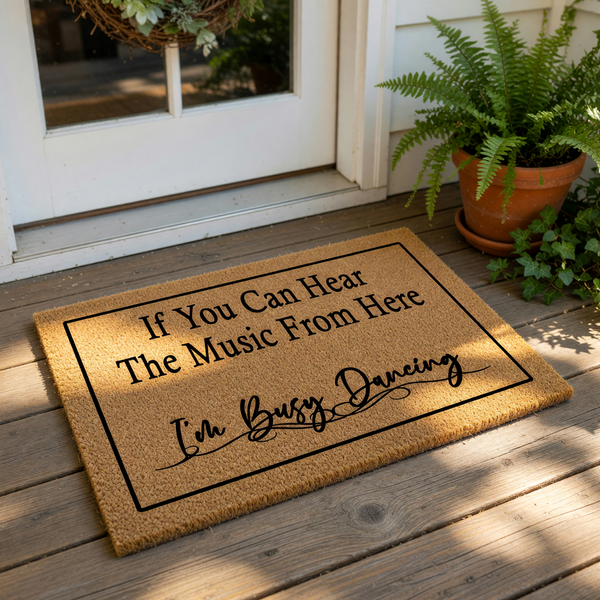 Funny music lover doormat with the text If You Can Hear The Music From Here I am Busy Dancing, this natural coir fiber welcome mat features a bold black border and is a great front porch decor piece for any dancer or music fan