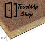 A close-up view of a textured surface, possibly a woven material or a natural plant fiber, with a warm, golden-brown color.