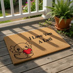 Axolotl welcome doormat featuring a cute cartoon salamander holding a red heart with the text I Love You A Lotl, this natural fiber coir entry mat is a fun decorative floor rug for your front porch or home entryway decor.