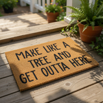 Funny doormat with the text Make Like A Tree And Get Outta Here printed in black on a natural coir fiber welcome mat, perfect for a front porch entry or housewarming decor that adds a humorous touch to your home entrance.