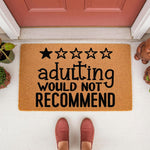 Funny Adulting Would Not Recommend doormat featuring a one-star rating design on natural coir fiber, perfect as a sarcastic housewarming gift or a humorous front porch welcome mat for your home entrance decor.