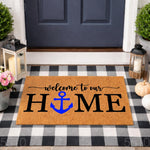 Nautical welcome to our home doormat with a blue anchor design on natural coir fiber, perfect for a coastal front porch decor style, featuring a durable welcome mat for entryways that adds a stylish touch to your house entrance.