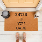 Enter If You Dare Halloween doormat, a natural fiber welcome mat for front porch decor featuring spooky skull and cauldron accents, perfect for a scary seasonal entryway or gothic home decor for the fall holiday season.
