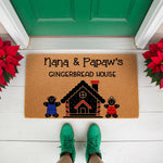 Personalized Nana and Papaw gingerbread house doormat featuring a festive holiday design on natural coir fiber, perfect for a Christmas welcome mat on your front porch to celebrate the season with family and home decor style.