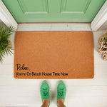 Beach house doormat with Relax You're On Beach House Time Now text, a natural coir welcome mat for front porch decor, featuring a durable fiber texture that makes a stylish entryway rug for coastal homes and vacation rental