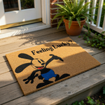 Funny cartoon rabbit doormat featuring a black and white character in blue shorts with the text Feeling Lucky, this natural coir welcome mat is a durable outdoor floor rug for your front porch entry or home decor entrance.