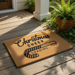 Christmas Cheer Loading candy cane doormat with a natural coir texture, featuring a festive holiday welcome mat design for your front porch decor that adds a fun seasonal touch to your home entrance during the winter holidays.