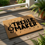 Treble Maker music doormat featuring a large treble clef and musical notes on a natural coir fiber welcome mat, perfect for a musician home entrance or a fun front porch decor piece for any music lover who enjoys playing