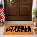 Treble Maker music doormat featuring a large treble clef and musical notes on a natural coir fiber welcome mat, perfect for a musician home entrance or front porch decor with a fun, punny design for music lovers and piano players.
