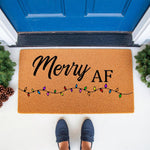 Funny Merry AF Christmas doormat with colorful holiday lights, a natural coir welcome mat for your front porch decor that adds a humorous touch to your seasonal home entrance and festive entryway floor mat styling.