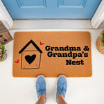 Grandma and Grandpa's Nest doormat featuring a house and heart design on natural coir fiber, perfect as a personalized front porch welcome mat for a grandparent home entrance with a stylish, durable outdoor floor rug look.