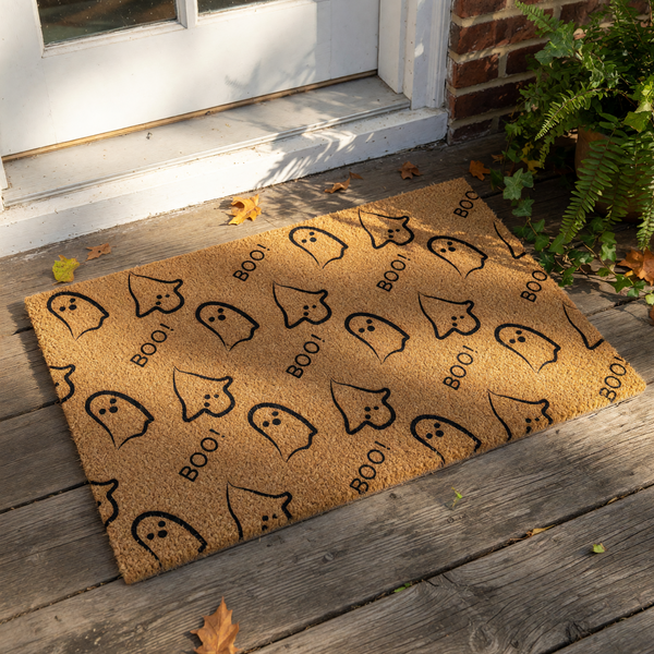 Cute ghost pattern doormat for Halloween, featuring a natural coir fiber welcome mat with black printed ghosts and BOO text, perfect for a spooky front porch entry decor or a fun seasonal home entrance floor rug for the fall